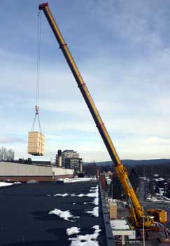 Lifting large components through the roof
